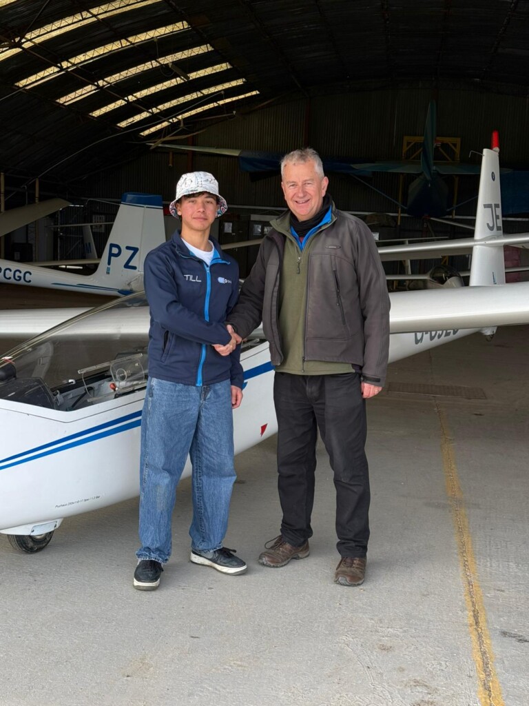 Myself and my instructor in the hangar